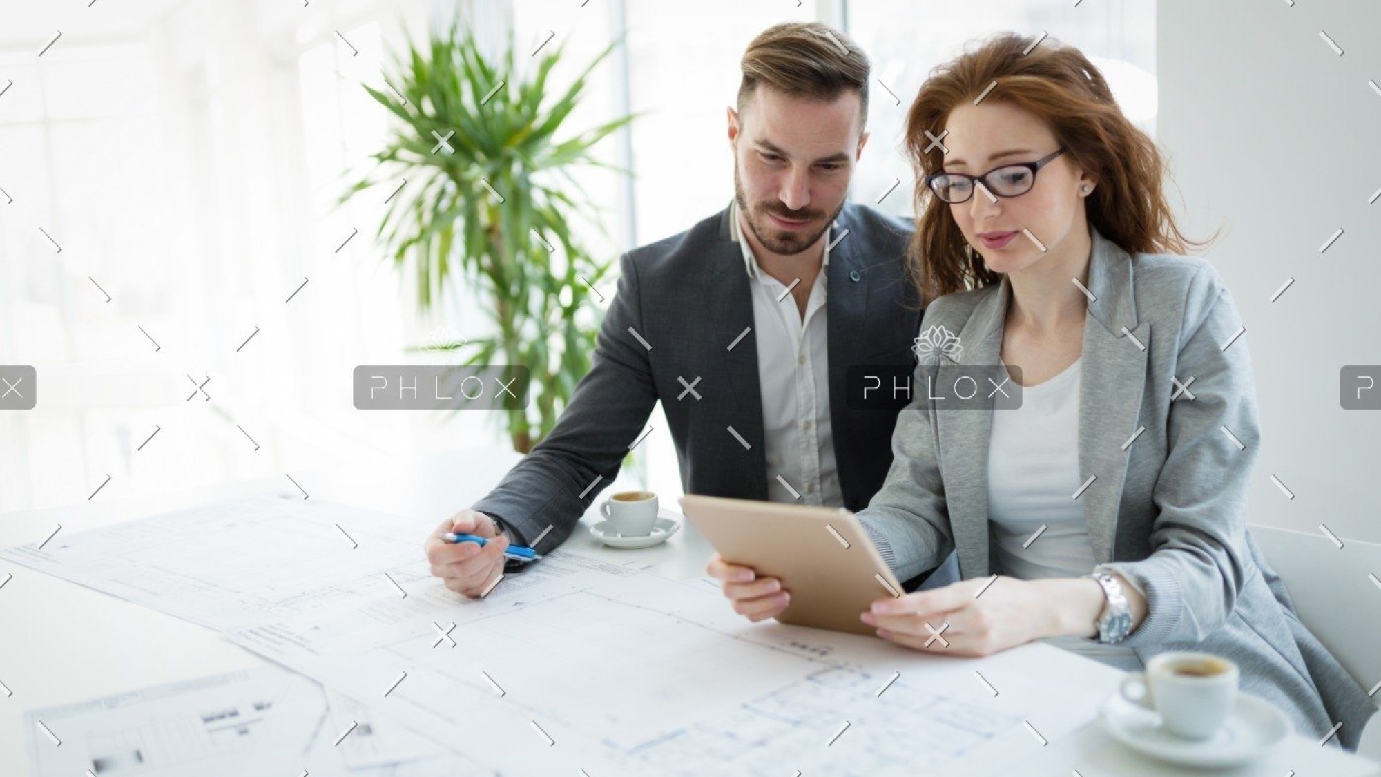 demo-attachment-2723-portrait-of-young-architect-woman-on-meeting-KFZCE3A